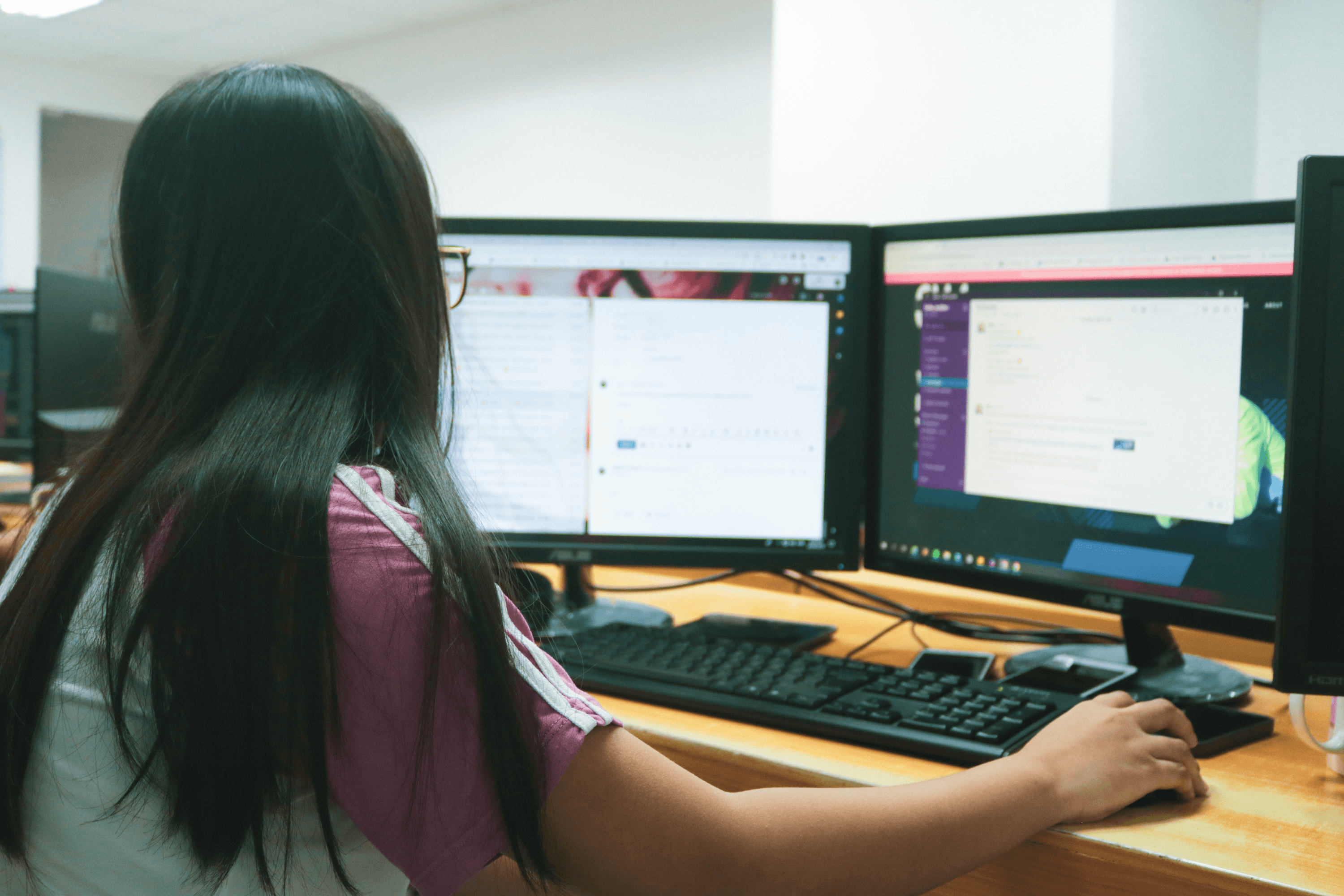 Woman working at computer screen