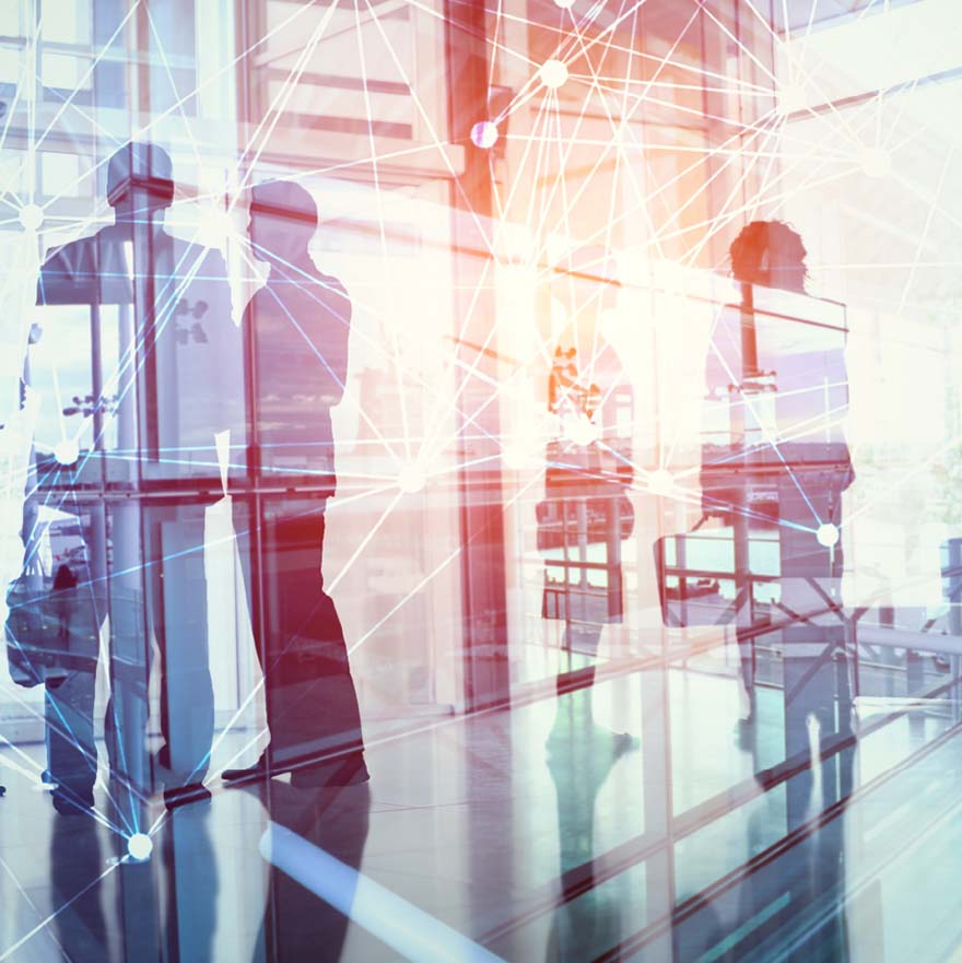 People behind glass office wall