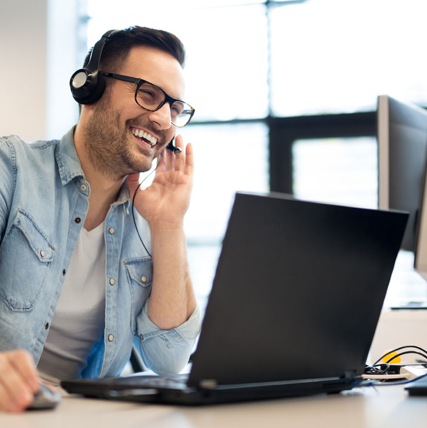 Customer support worker at computer